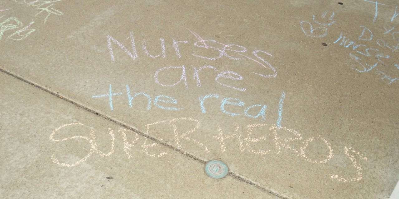 Family Spreads Kindness in Chalk on Kenmore Mercy’s Sidewalks